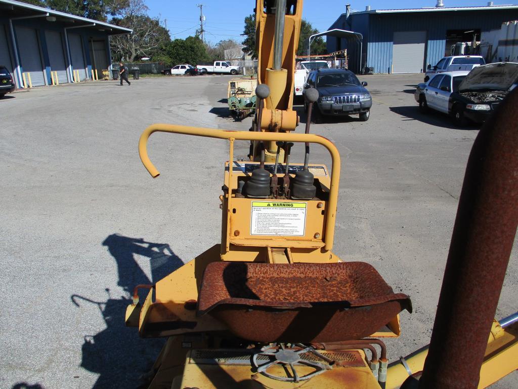 1998 Case 660 Trencher w/ D-125 Backhoe Attacment.