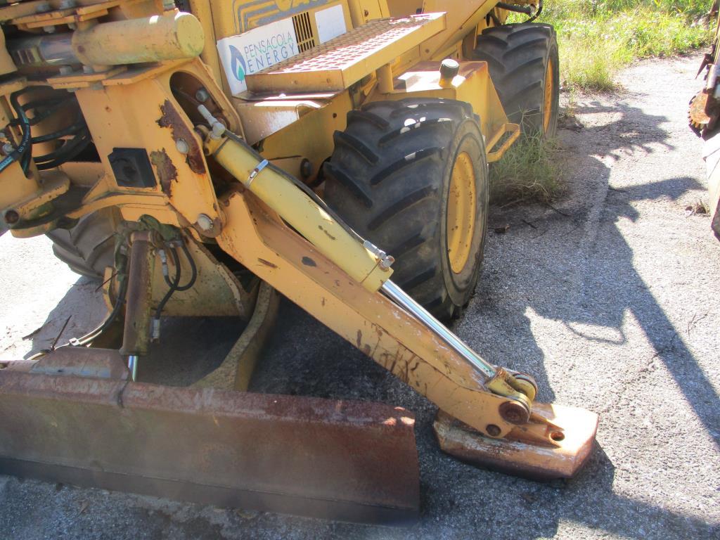 1998 Case 660 Trencher w/ D-125 Backhoe Attacment.