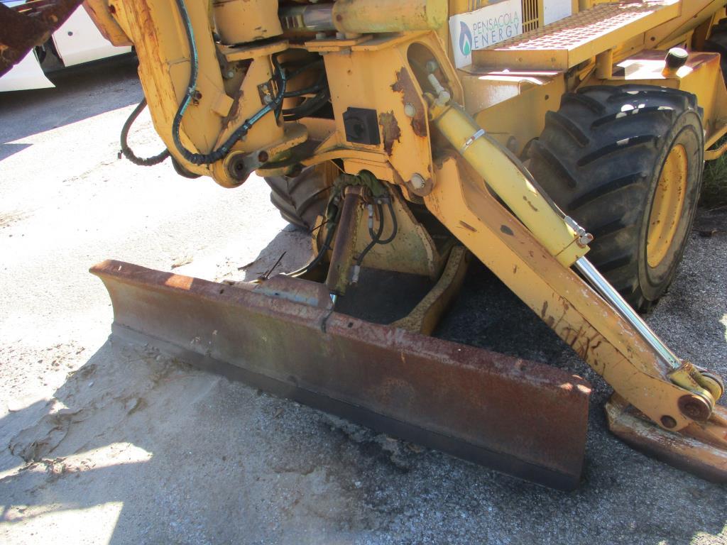 1998 Case 660 Trencher w/ D-125 Backhoe Attacment.