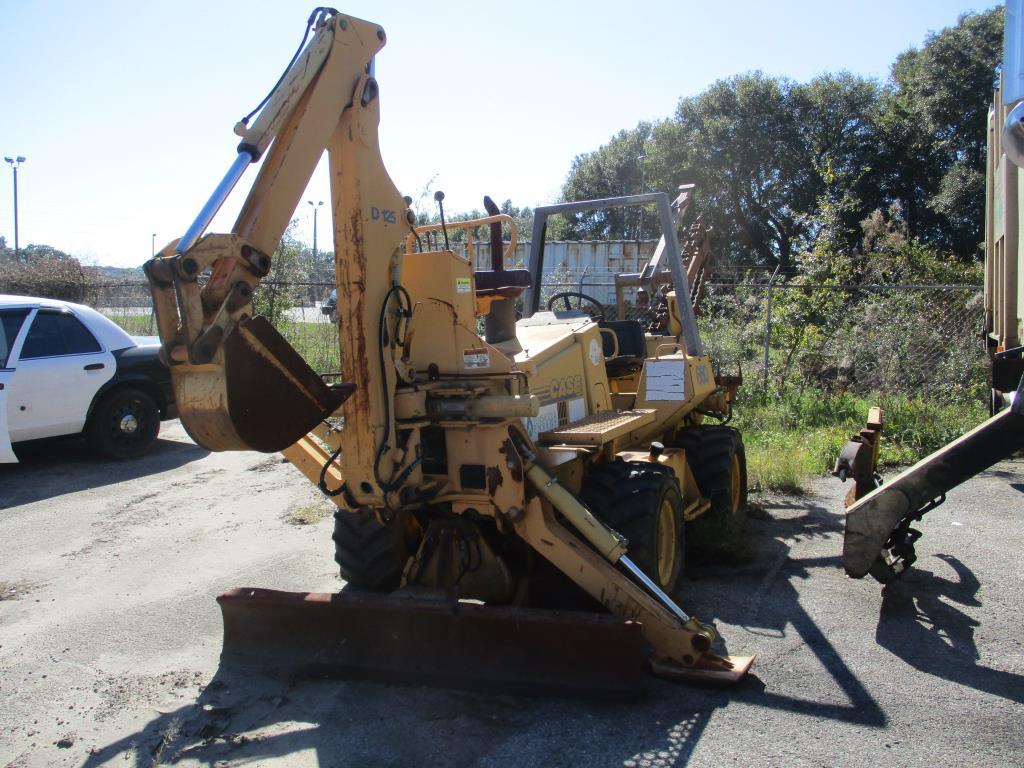 1998 Case 660 Trencher w/ D-125 Backhoe Attacment.