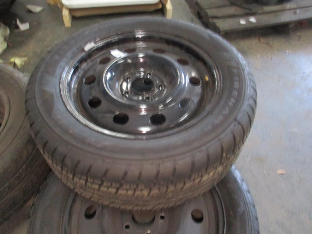 (4) Firestone Firehawk Tires w/ Rims.