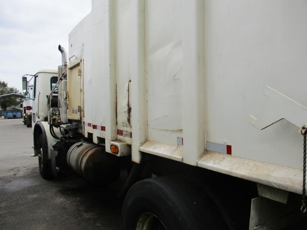 2002 Volvo WXR42 Side Loader Garbage Truck.