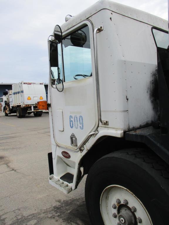 1994 Peterbilt 320 Side Loader Garbage Truck.