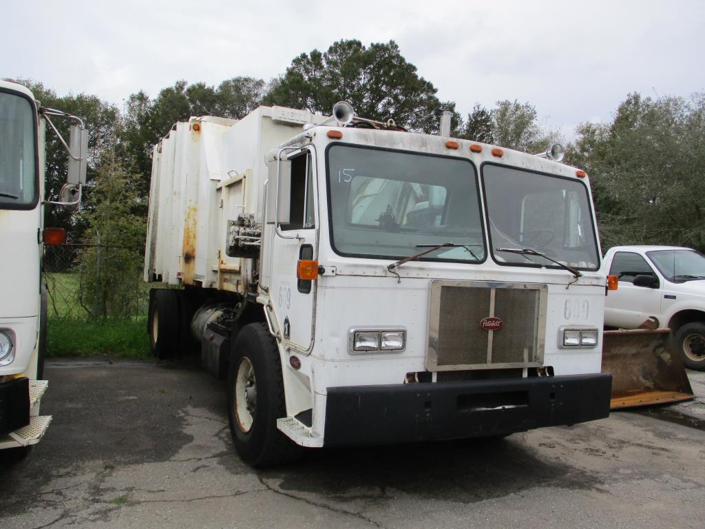 1994 Peterbilt 320 Side Loader Garbage Truck.