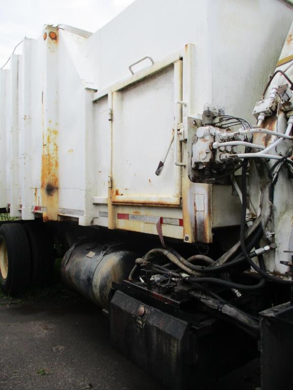 1994 Peterbilt 320 Side Loader Garbage Truck.