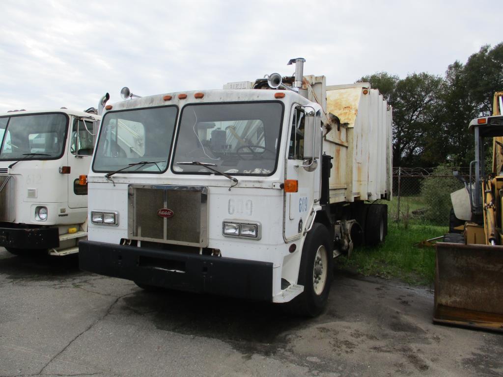 1994 Peterbilt 320 Side Loader Garbage Truck.