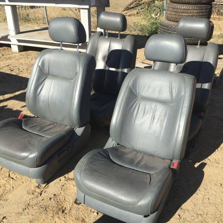 (4) Cadillac Escalade Seats.