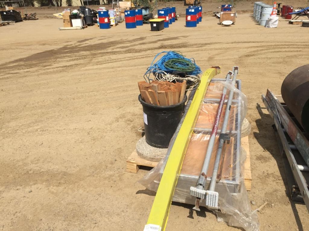 Pallet of Misc Wire, Stakes and Dry Wall Jacks.