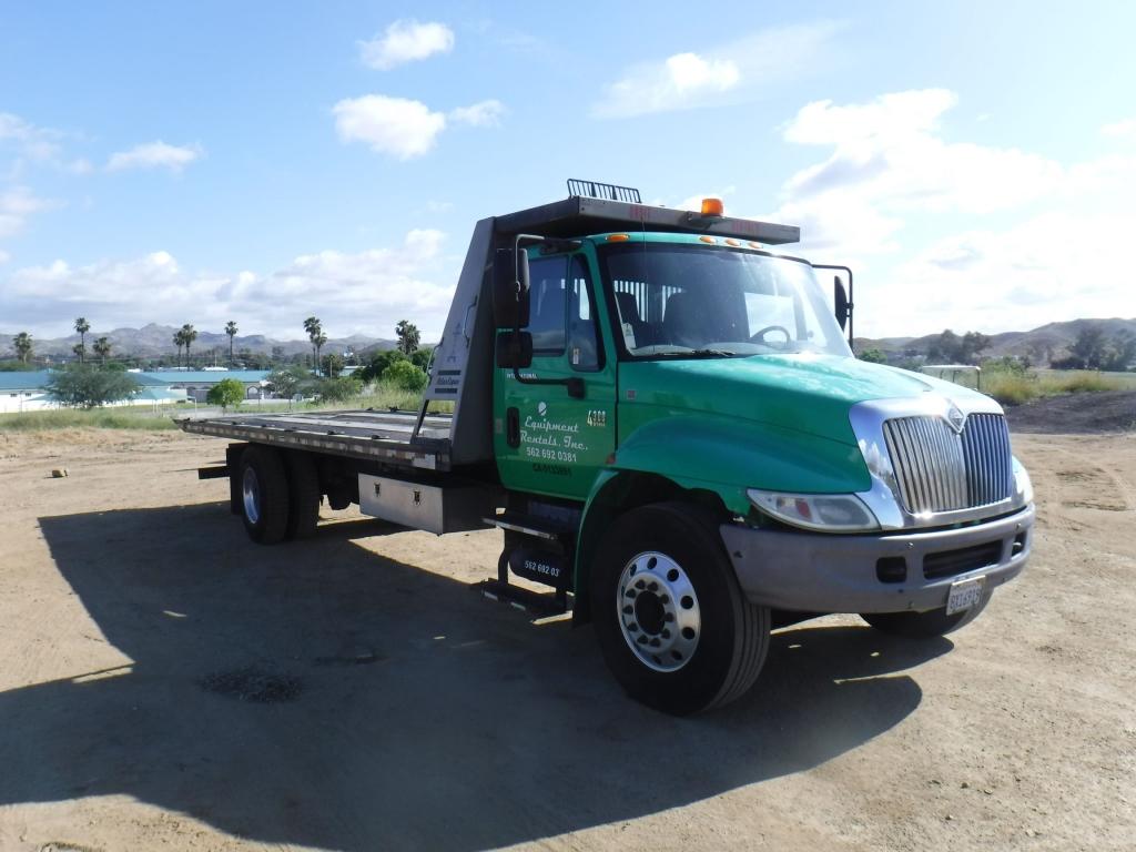 International 4300 Roll Back Truck,