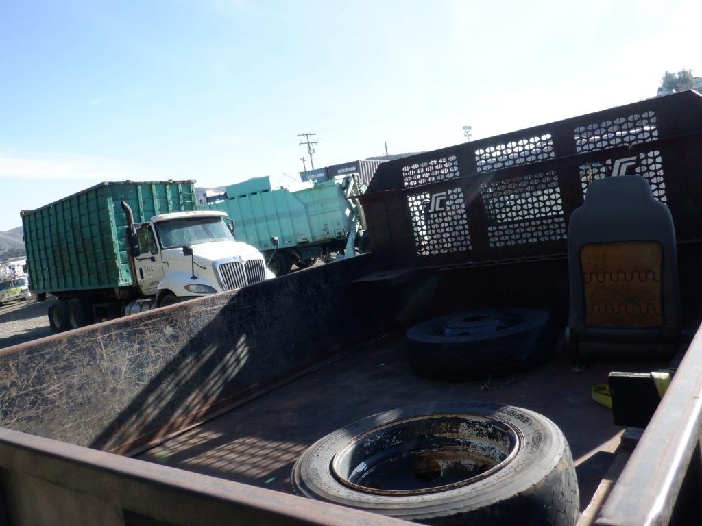 Isuzu NPR HD Flatbed Dump Truck