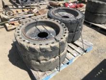 (4) 7.5x20 Skid Steer Tires & 8 Lug Rims.