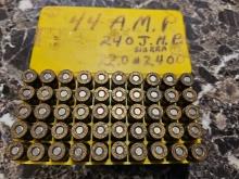 Lot of 44 AMP Auto Mag Bullets w/ Plastic Container