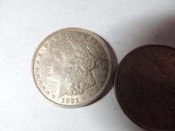 Two 1921 Morgan Dollars