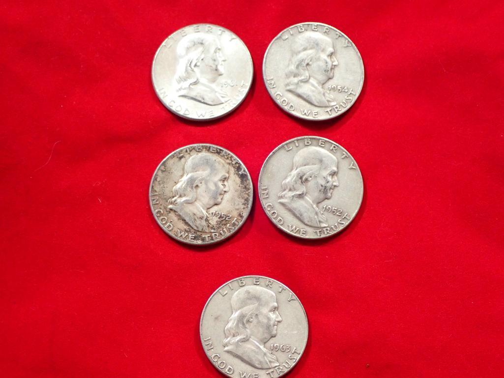 Five Franklin Half Dollars