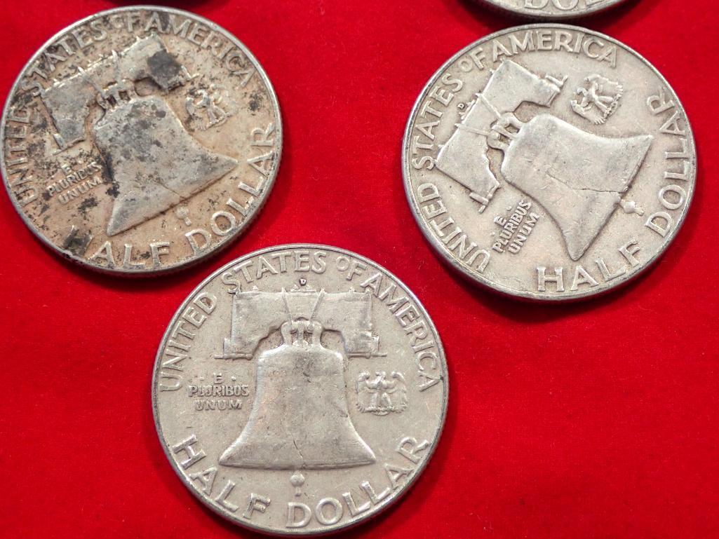 Five Franklin Half Dollars