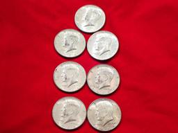 Seven 1964 Kennedy Half Dollars