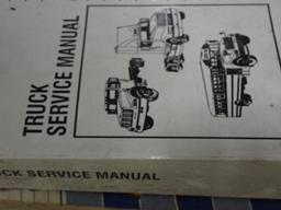 Large Group of School Bus Repair Manuals