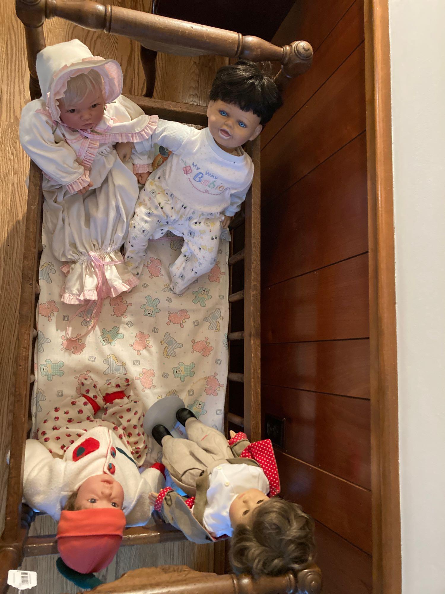 Wooden Baby Cradle with Four Dolls