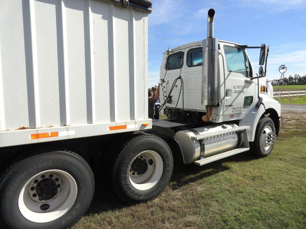 COMBO: 2006 Sterling Semi Tractor AND 1998 42’ Hawk Master Steel Grain Trailer