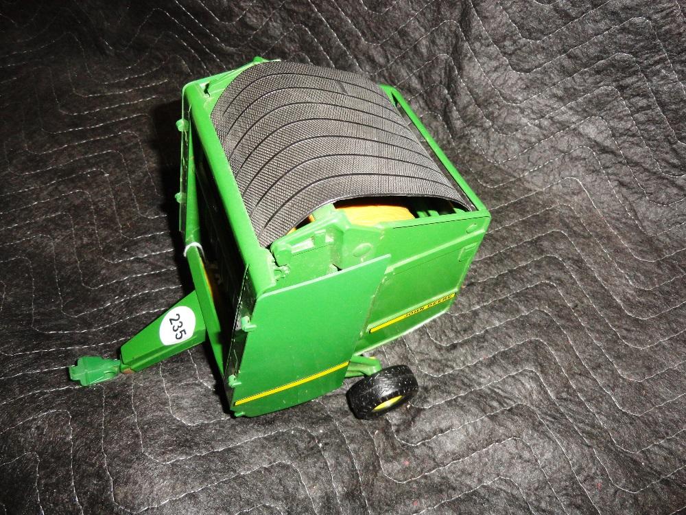 JD 530 Round Baler, New with Bale