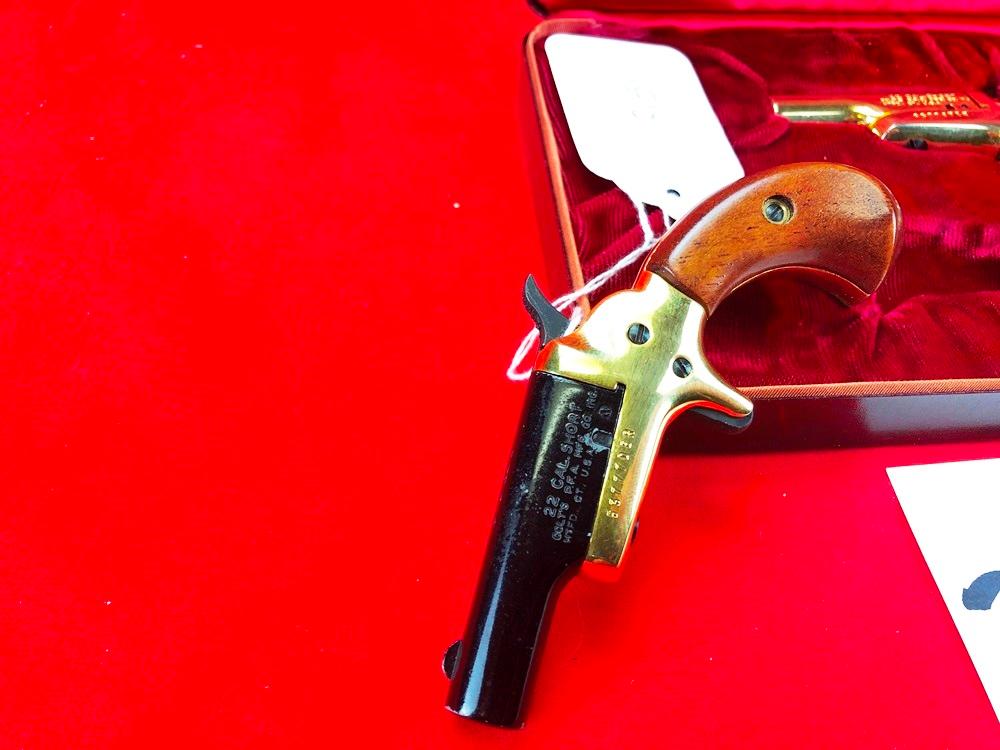 Colt Derringer 2-Gun Set: 22-Shot, Gold w/Pearl, SN:53778DER AND Colt Derringer 22-Shot Gold w/Wood,