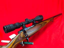 Ruger M.77, 22-250, Heavy Bbl. w/Simmons 4x10 Scope, Beautiful Laminated Stock, Tang Safety, SN:771-