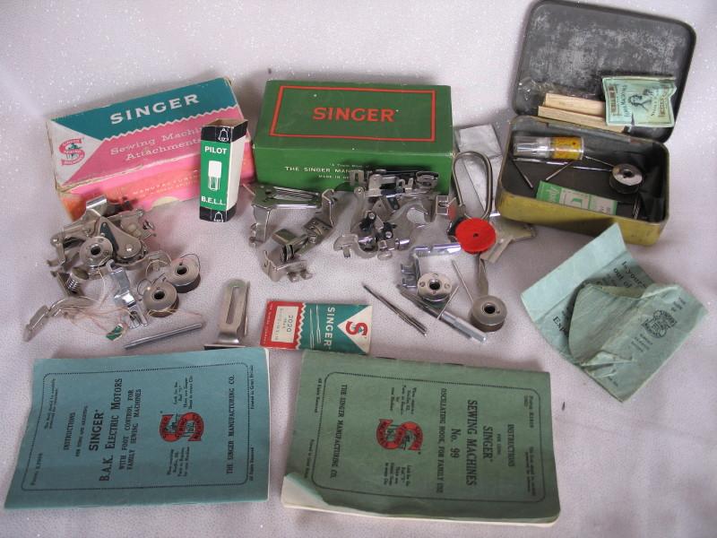 Mixed vintage Singer Sewing machine parts includes:- 1920-30s manual books