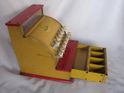 Three toys:- Boomaroo cash register with some child wear and rust showing.