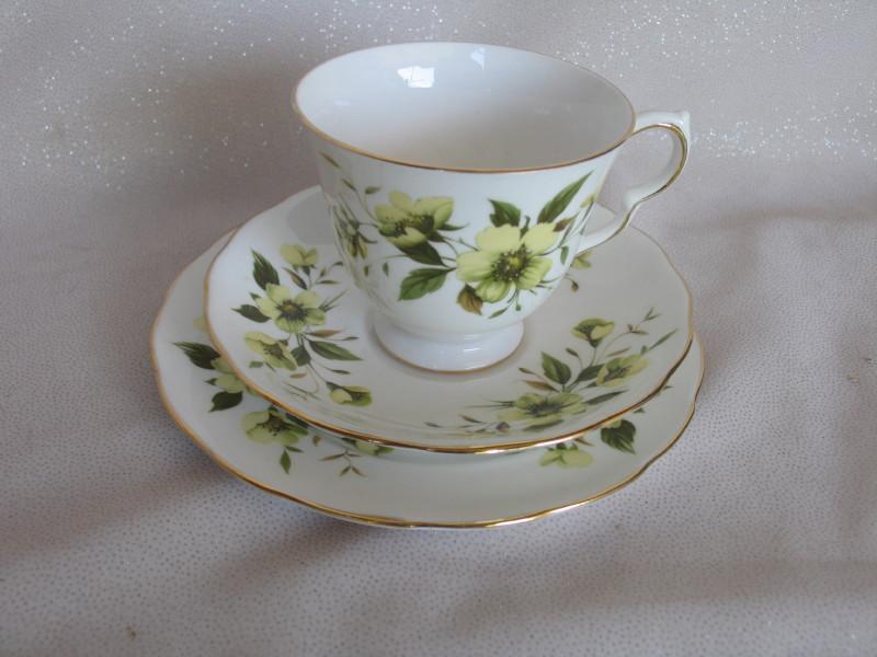 Four vintage Bone China Trio's. All floral patterns by Crown Staffordshire,