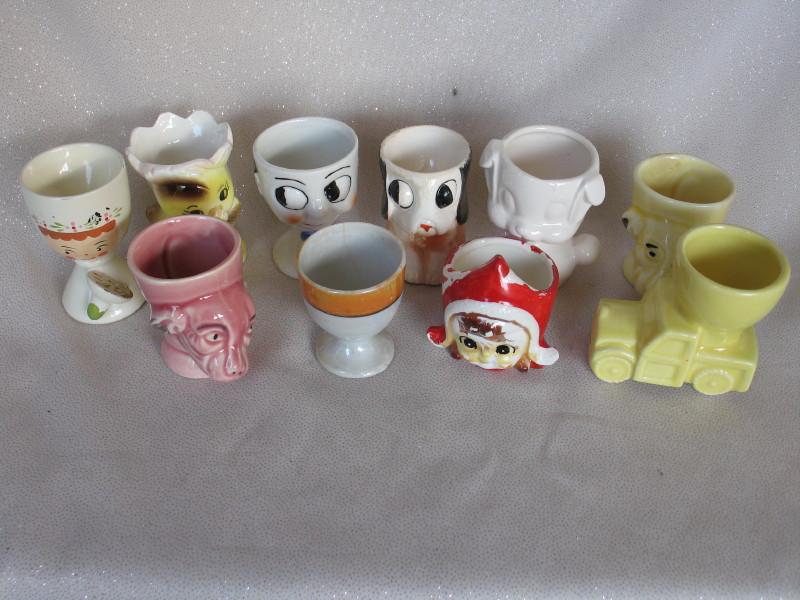 Forty Egg Cups:- includes mostly Japan, Kitsch, Mulga wood, animals, googly