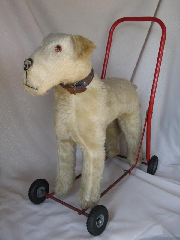 Vintage 1950s Tri-ang push-along Fox Terrier dog, 61cm to red tube steel ha