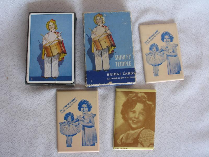 Mixed Shirley Temple collectibles:- 1930s pack of Bridge Cards in box, two