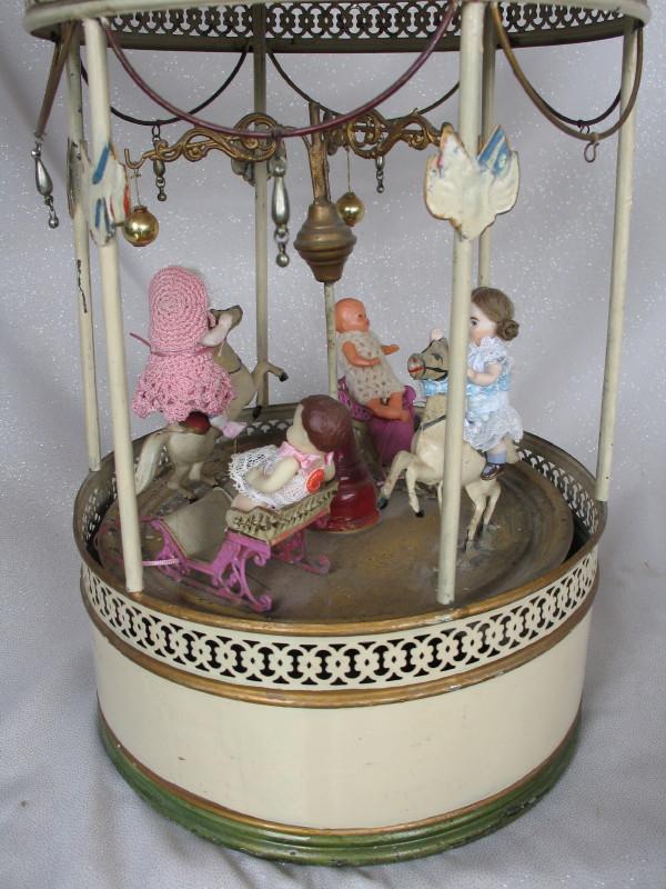 Working child 1920s Tin Clockwork Carousel Merry-Go-Round. Possible German