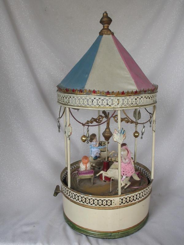 Working child 1920s Tin Clockwork Carousel Merry-Go-Round. Possible German