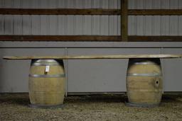 TWO WINE BARRELS AND A WOOD SLAB