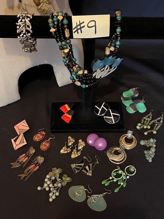 LARGE LOT OF EARRINGS, THREE NECKLACES AND A BRACELET",