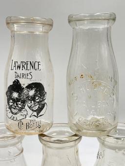 FIVE ANTIQUE GLASS MILK JARS