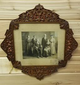 FRAMED CARVED BY A VIOLIN MAKER IN 1912, FAMILY PORTRAIT