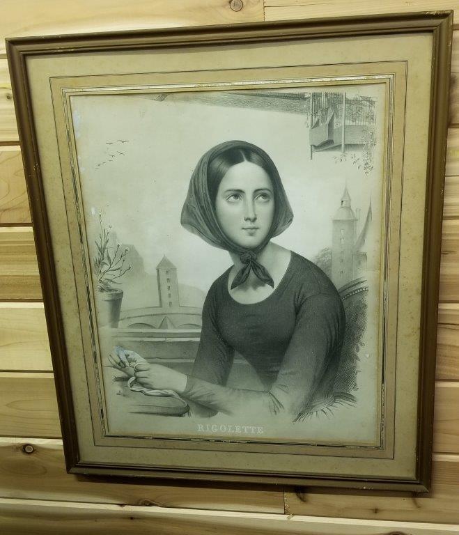 FRAMED LITHO OF A WOMAN