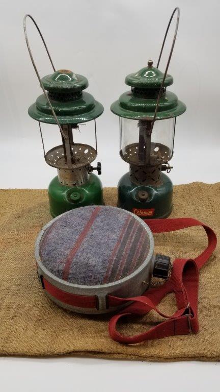 TWO VINTAGE COLEMAN LANTERNS AND A GALVANIZED CANTEEN