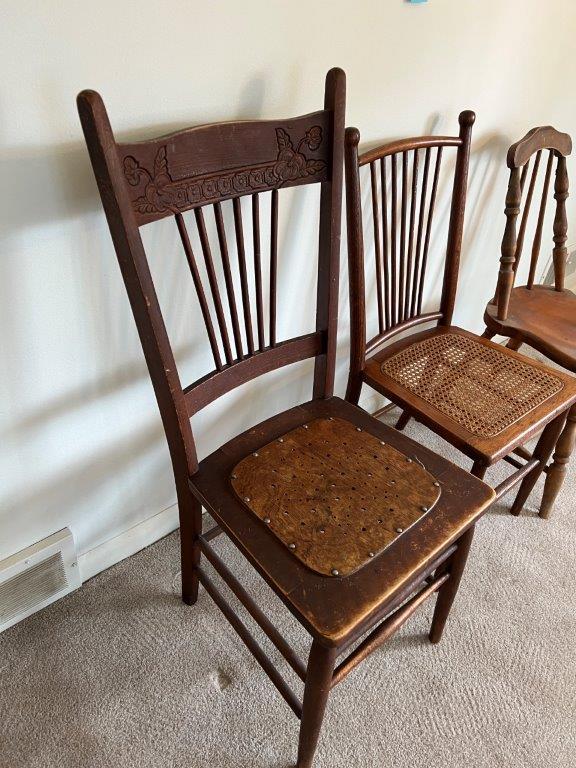 3 Spindle Back Wood Chairs, 1 has "caned" woven seat