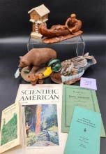 "Trapper in Canoe" figurine, 1930 Scientific American, and more