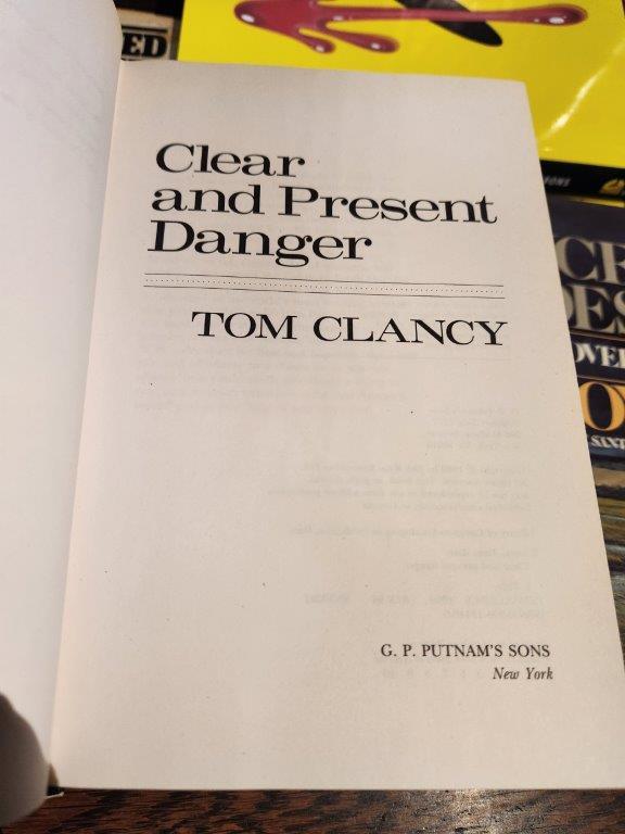 "Clear and Present Danger", 1st ed "Me Talk Pretty One Day"