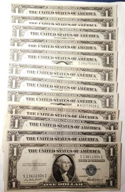 (12) 1935-A,D,E,F $1.00 SILVER CERTIFICATES XF/AU