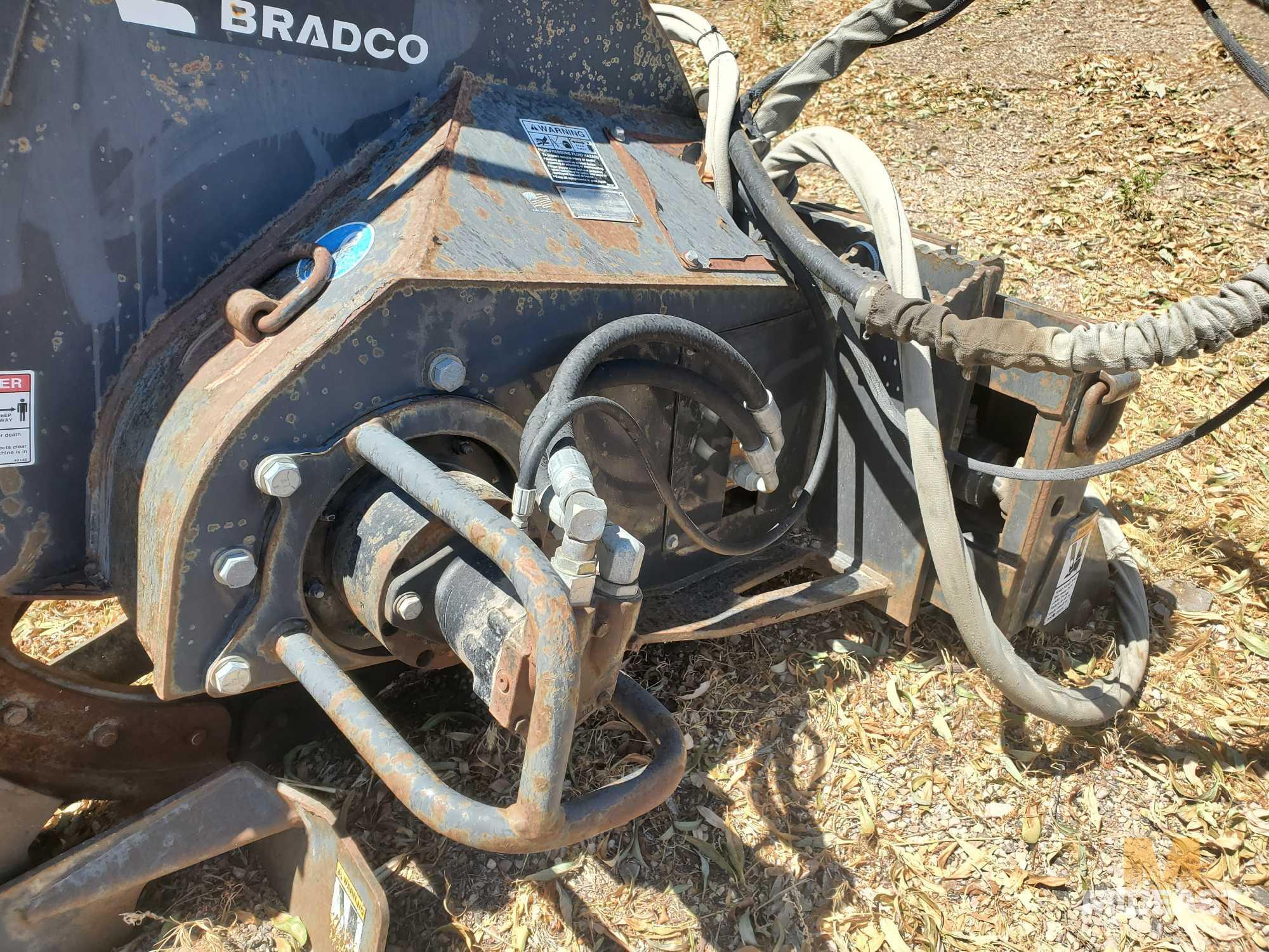 Bradco Rock Saw skid steer attachment.