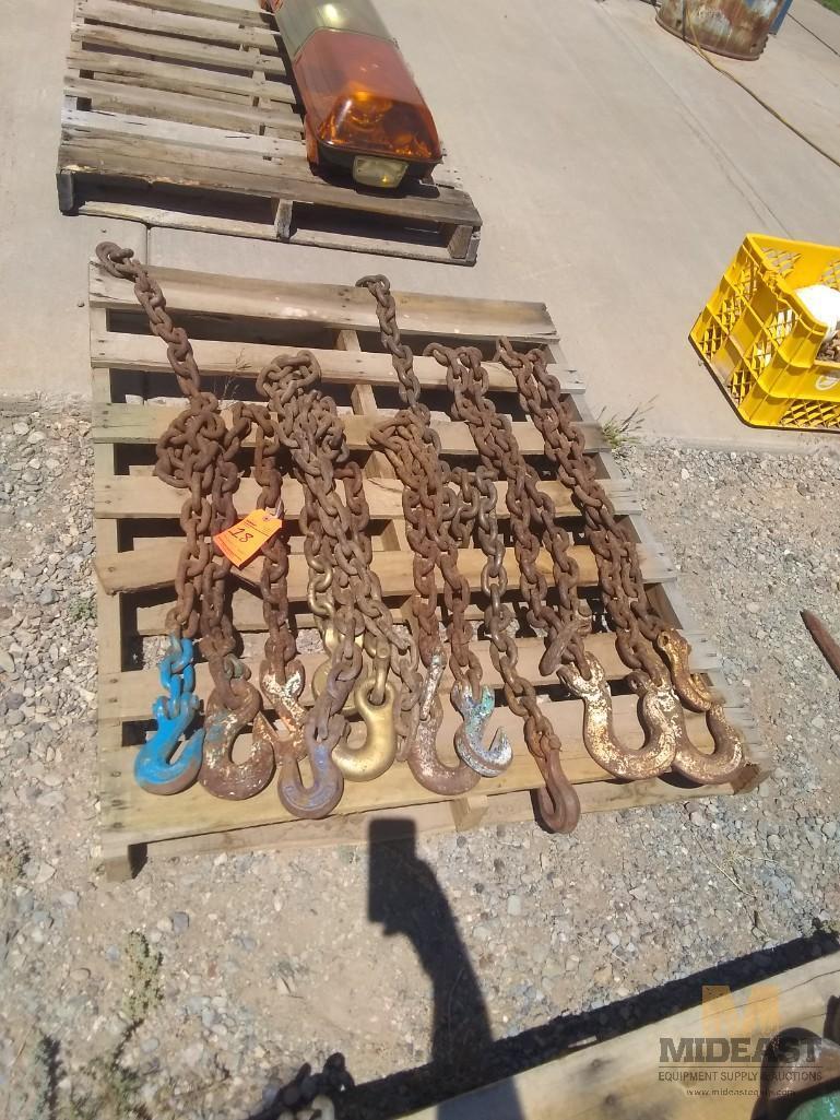 Skid Lot of (8) Various Sized and Length Chains With Various Lifting and Slotted Hooks