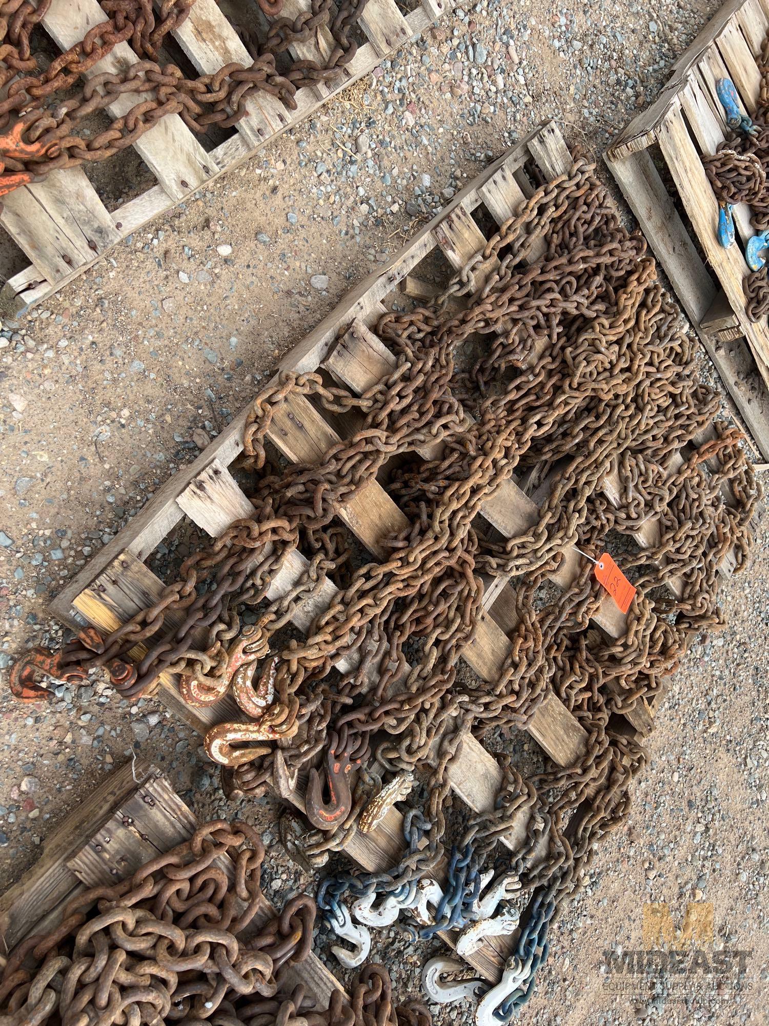 Skid Lot of (10) Various Sized and Length Chains With Various Lifting and Slotted Hooks