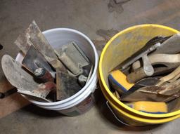 Two buckets miscellaneous concrete tools