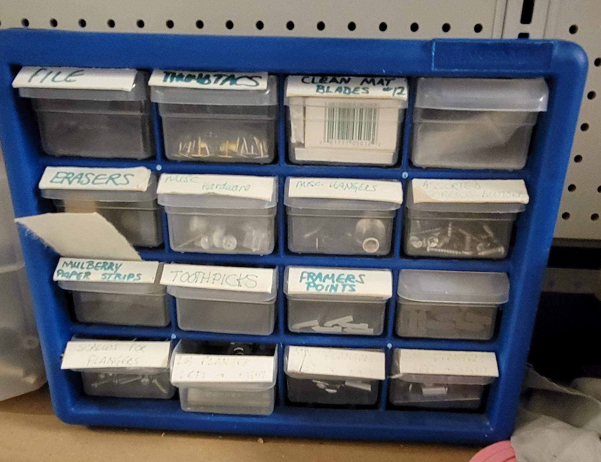 2 organizers with misc. points, nails, screws, etc…