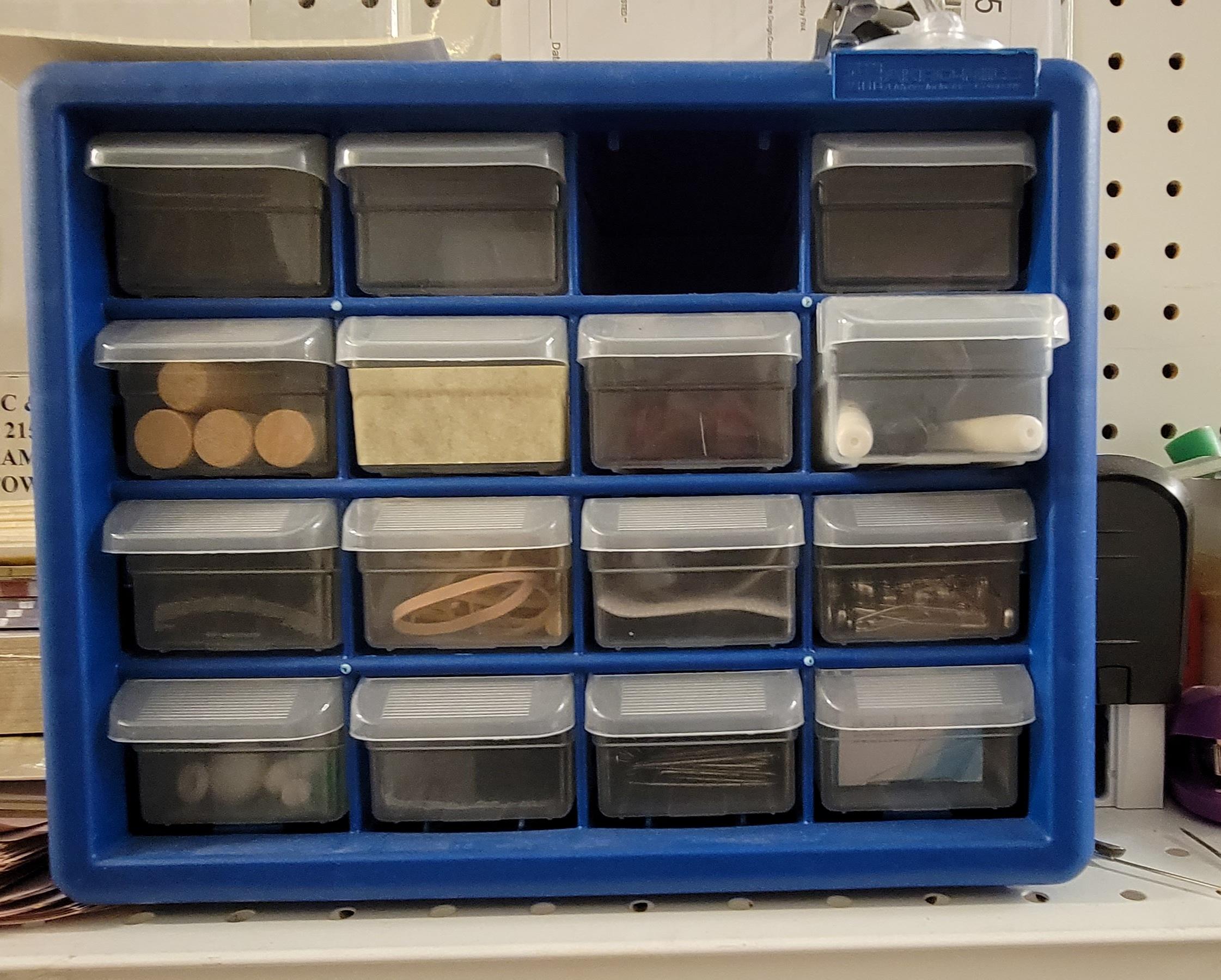 2 organizers with misc. points, nails, screws, etc…